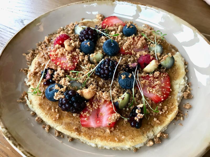 Paleo Diet Pancake with Organic Fruits served at Restaurant / Crepe. royalty free stock photo Paleo Diet Pancake with Organic Fruits served at Restaurant / Crepe. royalty free stock photo
