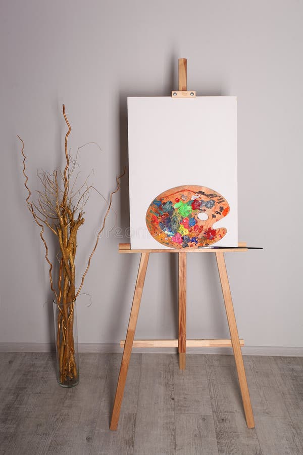 A palette on the easel stock image. Image of branches 103220747