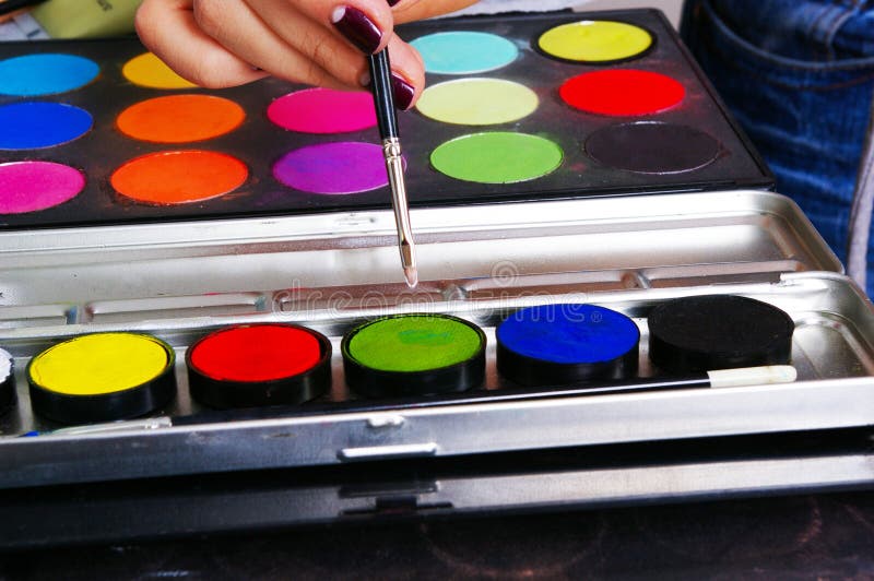 Palette of a grease paint on the makeup artist's workplace. Palette of a grease paint on the makeup artist's workplace