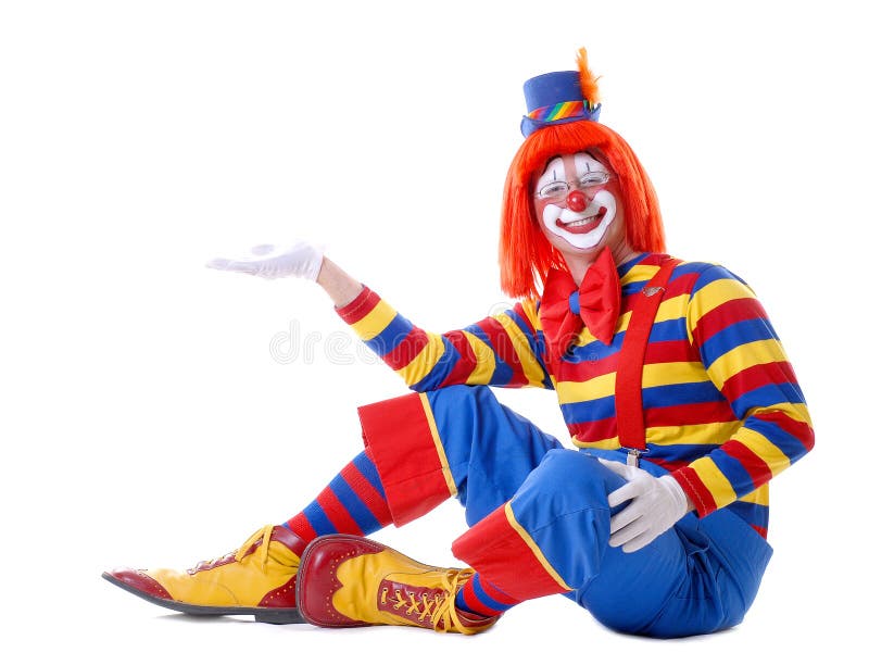 Sitting circus clown holding your product in his hand. Sitting circus clown holding your product in his hand