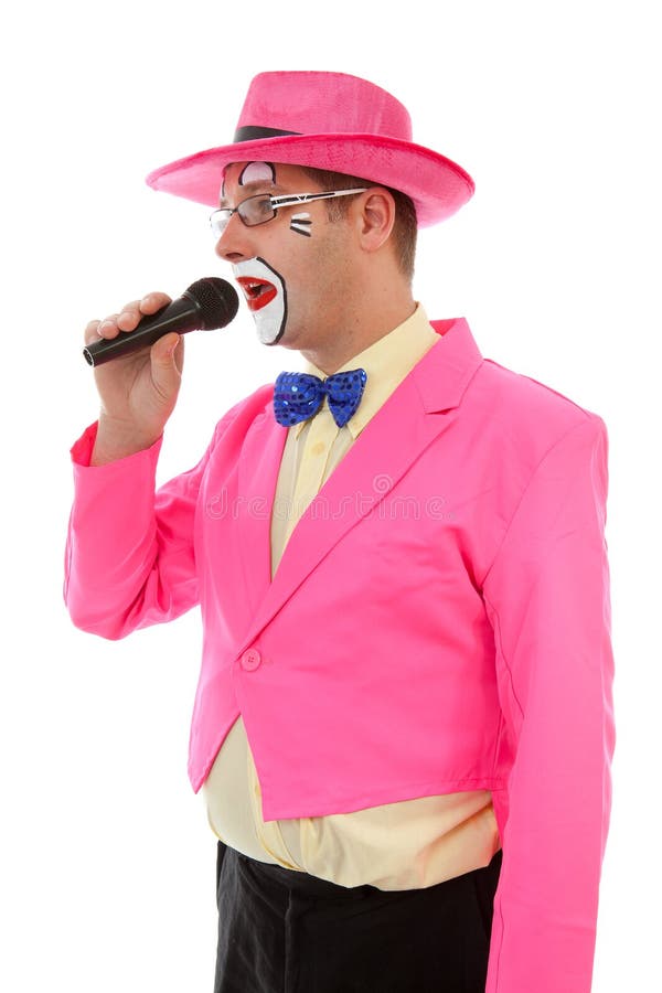 Palhaço masculino como o ringmaster na cor-de-rosa fotografia de stock Palhaço masculino como o ringmaster na cor-de-rosa fotografia de stock
