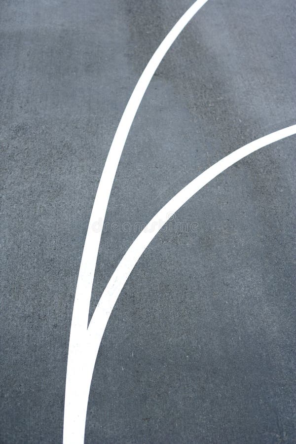 Basketball court lines on a street court. Basketball court lines on a street court