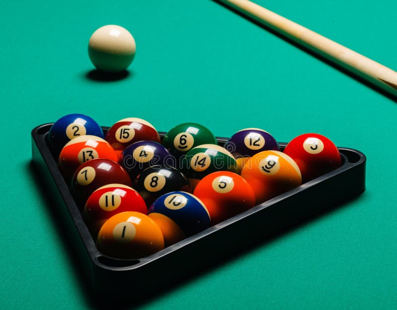 Billiard balls in a pool table closeup. Billiard balls in a pool table closeup
