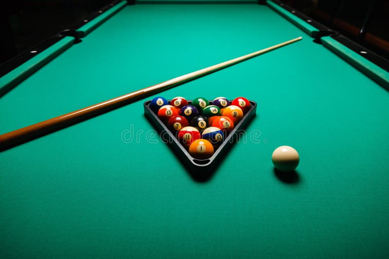 Billiard balls in a pool table closeup. Billiard balls in a pool table closeup.