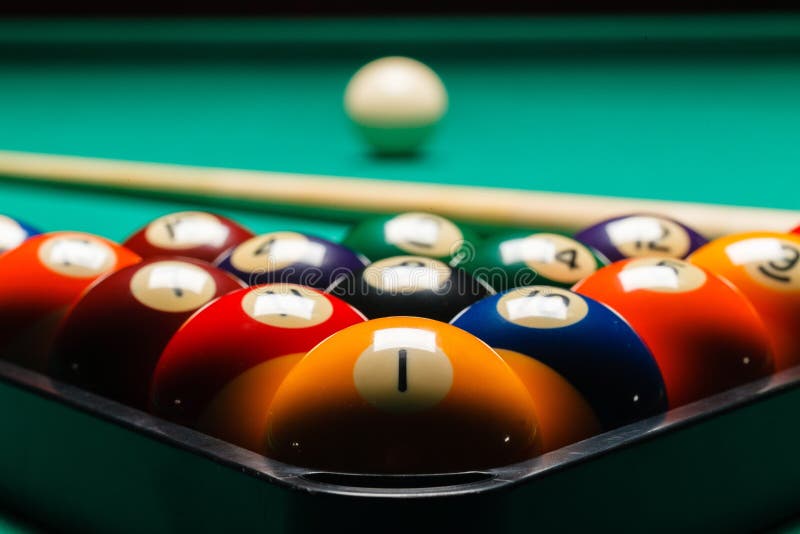 Billiard balls in a pool table closeup. Billiard balls in a pool table closeup