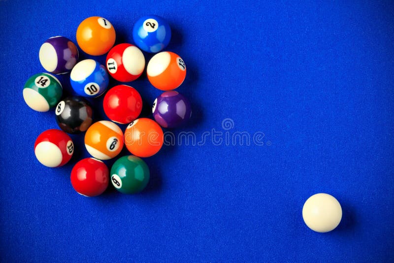 Billiard balls in a blue pool table. Horizontal image viewed from above. Billiard balls in a blue pool table. Horizontal image viewed from above.