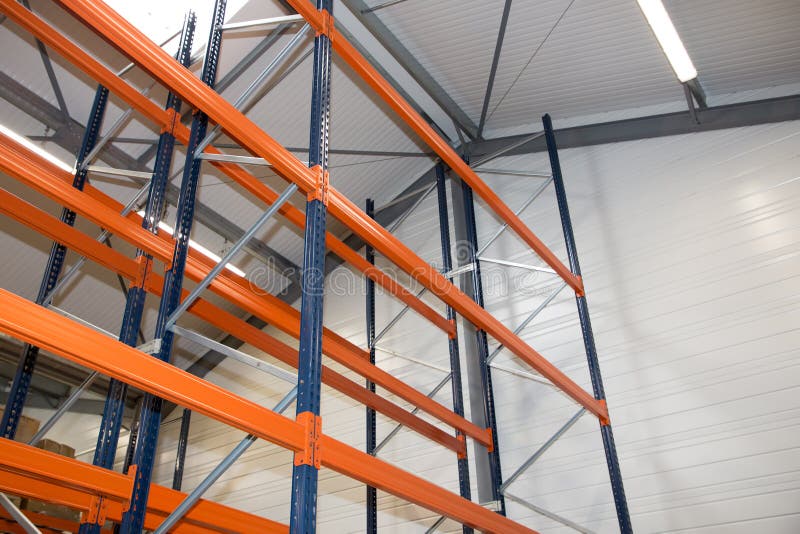 Pallet het rekken systeemmateriaal voor pakhuisplanken, rekkenblauw stock foto Pallet het rekken systeemmateriaal voor pakhuisplanken, rekkenblauw stock foto