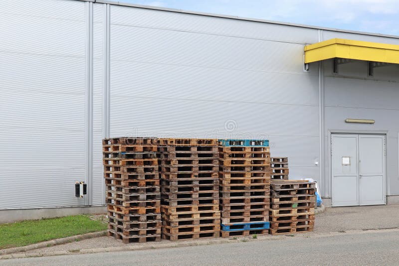 Pallets Next To the Warehouse Building Stock Image Image of yellow