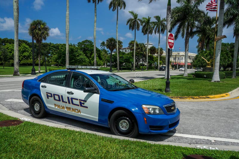 Palm Beach police department car provides security at the Royal Poinciana Way, Palm Beach, Florida