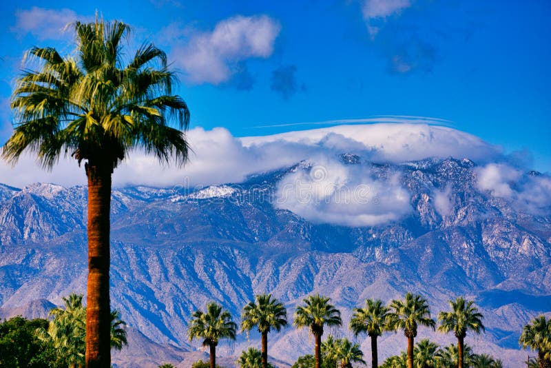 Palm Desert Mountains clouds sky California Palm trees