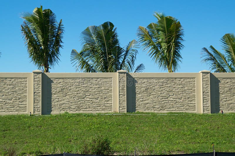 Palm Trees Behind Wall on Top of Hill Stock Photo - Image of blue ...
