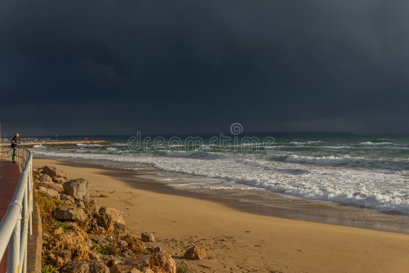 Can Pere Antoni beach a day of windy storm