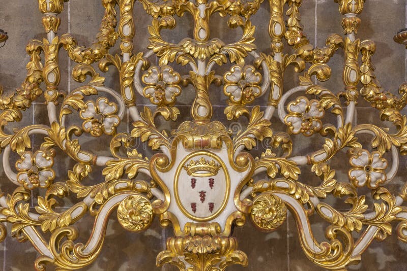 PALMA DE MALLORCA, SPAIN - JANUARY 29, 2019: The detail of baroque candlestick in the church Esglesia de la Inmaculada Concepcion