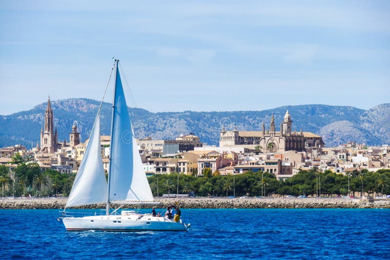 Palma de Mallorca, Spain. View from the sea with boath on a hot stock image Palma de Mallorca, Spain. View from the sea with boath on a hot stock image