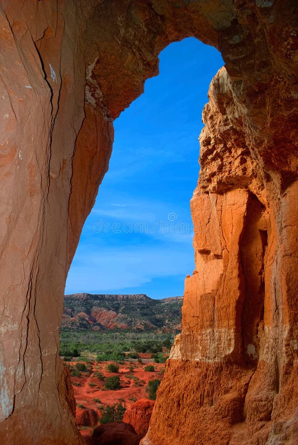 A view of Palo Duro Canyon floor from a cliffside cave. A view of Palo Duro Canyon floor from a cliffside cave