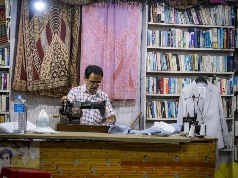 Indian tailor at work editorial photo. Image of common 70999866
