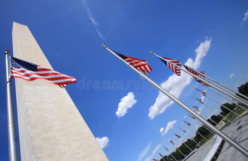 Washington, DC's Washington Memorial shot with a wide angle lens, surrounded by American flags. Washington, DC's Washington Memorial shot with a wide angle lens, surrounded by American flags.