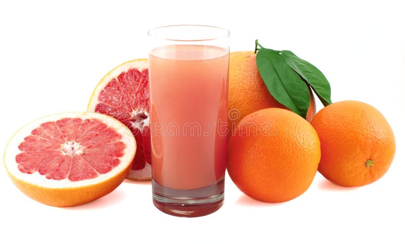 Pamplemousse juteux, oranges et verre de jus photo libre de droits
