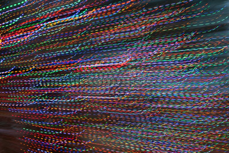 Pan Of Colorful Holiday Lights Creates Abstract Motion Background