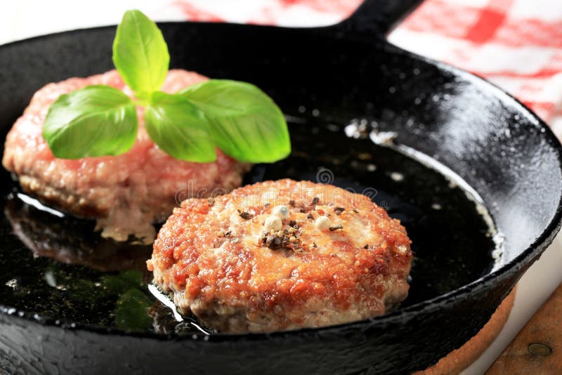 Pan fried patties stock image. Image of seared, hamburger 33162425