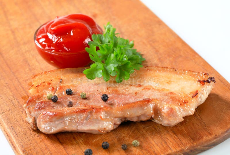 Pan fried pork belly stock photo. Image of board, tomato 31989308