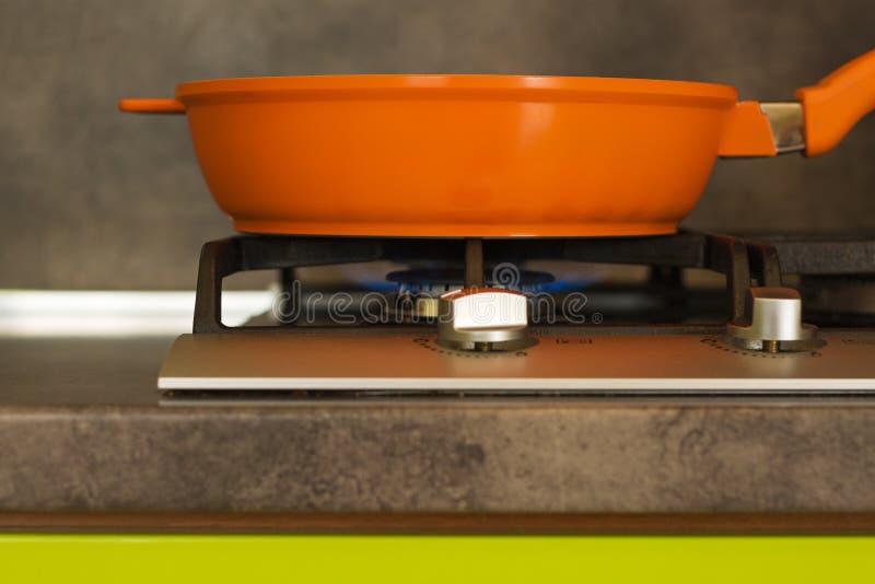 Pan on the stove stock photo. Image of saucepan, green 31689278