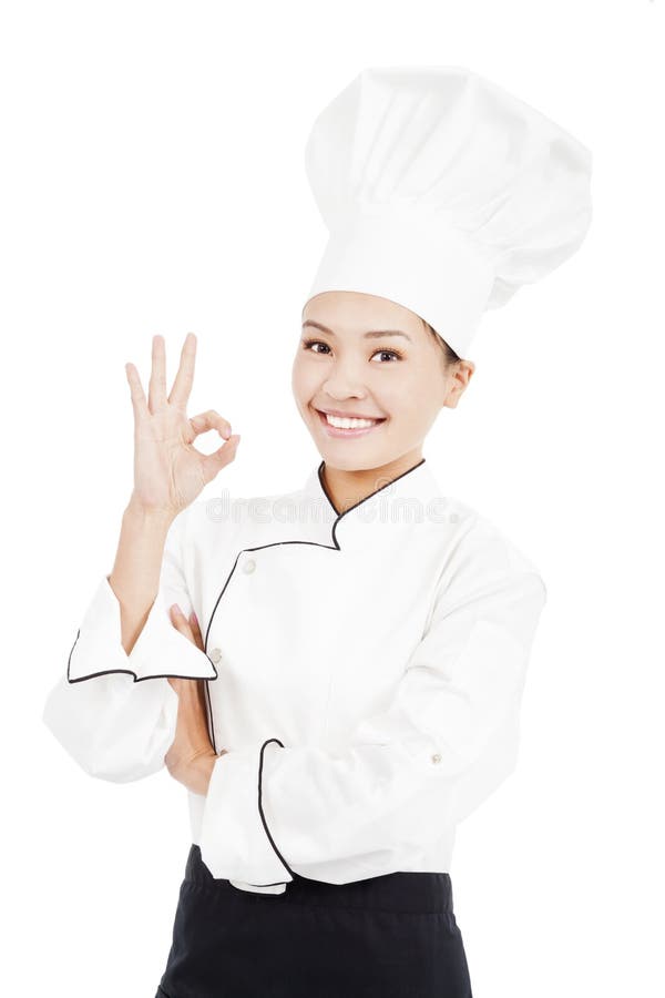 Panadero o cocinero del cocinero que muestra la muestra aceptable de la mano para la perfección imágenes de archivo libres de regalías Panadero o cocinero del cocinero que muestra la muestra aceptable de la mano para la perfección imágenes de archivo libres de regalías