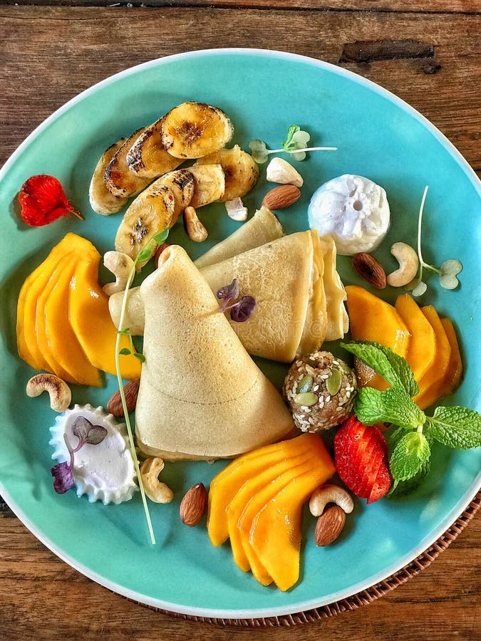 Pancake and fruit at breakfast stock photos Pancake and fruit at breakfast stock photos