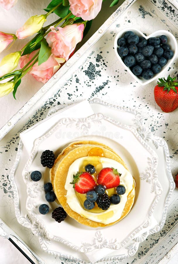 Pancake Breakfast Tray In Bed With Syrup And Blueberries Fruit Flat Lay
