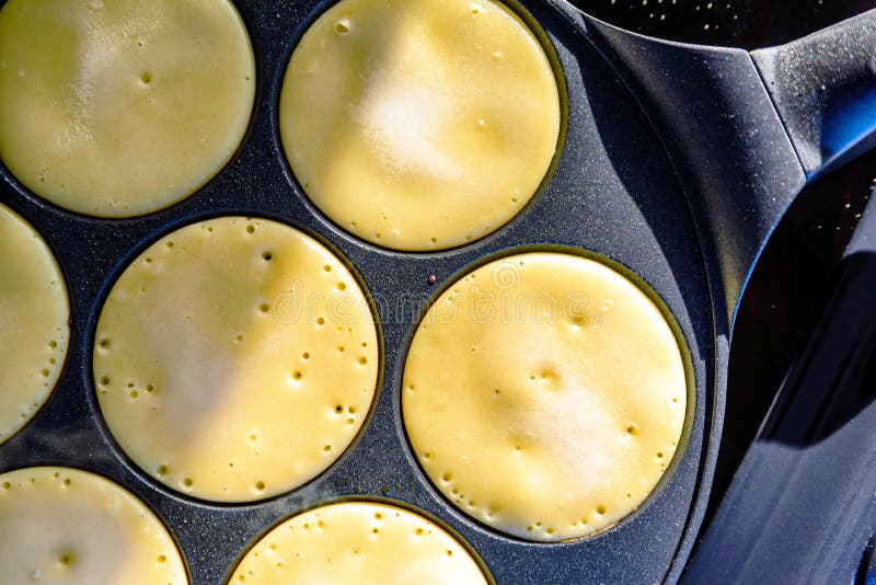 Pancake Frying Pan with Smile Face Pancake Cooking on Cooker in Kitchen