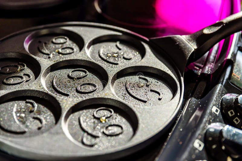 Pancake Frying Pan with Smile Face Pancake Cooking on Cooker in Kitchen