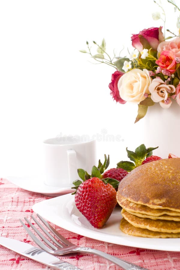 Pancake maple syrup on top with coffee