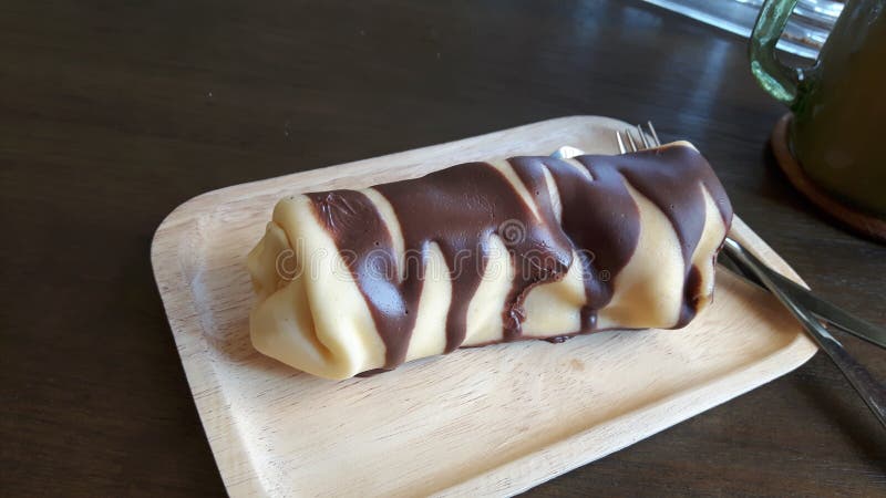 Pancake Rolls In Wooden Trencher Plate Stock Image - Image of grated ... Pancake Rolls In Wooden Trencher Plate Stock Image - Image of grated ...