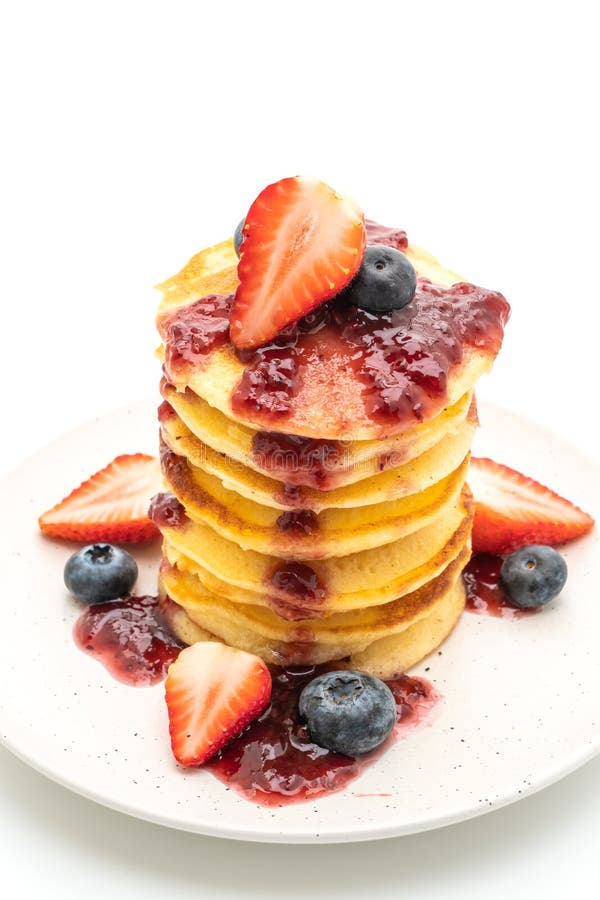 Pancake with Strawberries, Blueberries and Berry Sauce Stock Image