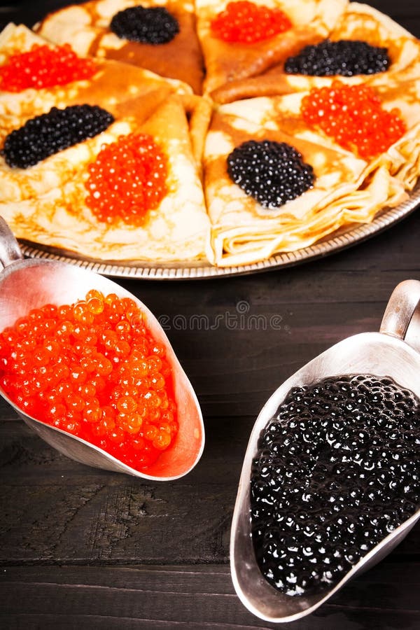 Масленица блины с черной икрой