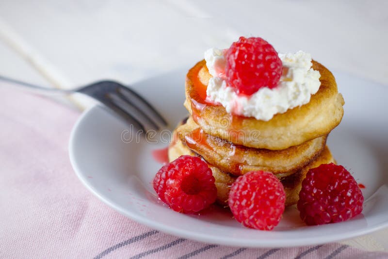 Pancakes with custard and raspberries royalty free stock images Pancakes with custard and raspberries royalty free stock images