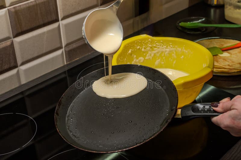 Pancakes are Fried in a Pan on an Induction Stove Stock Image Image