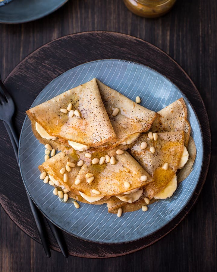 Pancakes with Honey, Bananas and Pine Nuts Stock Photo - Image of honey ...