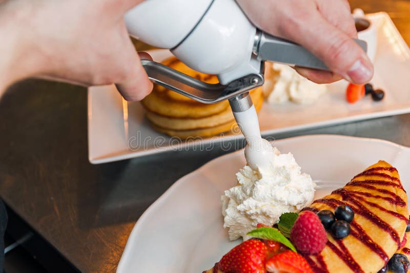 148 Whipped Cream Dispenser Stock Photos - Free & Royalty-Free Stock Photos  from Dreamstime