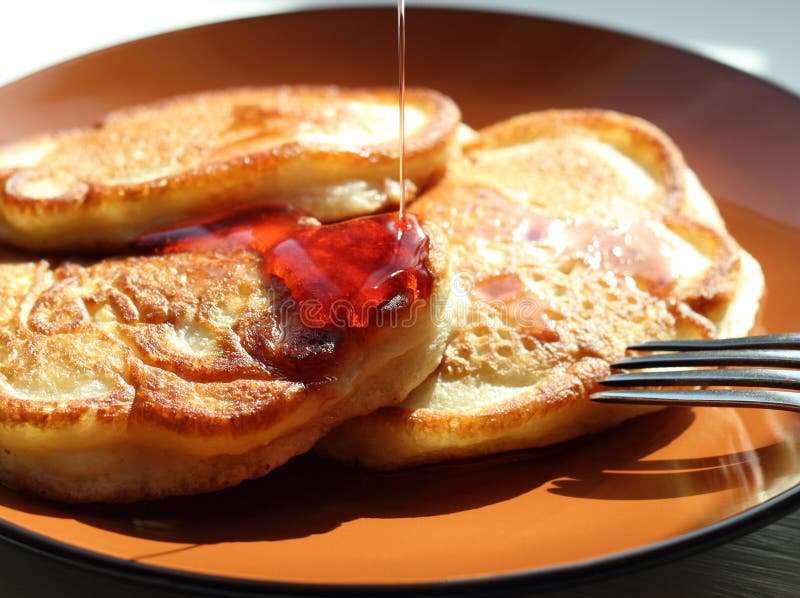 Buttermilk pancakes with strawberry syrup