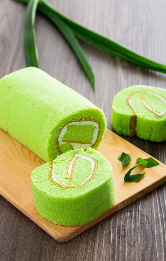 Pandan Swiss Roll Cake on Wooden Table Stock Photo - Image of pastry ...