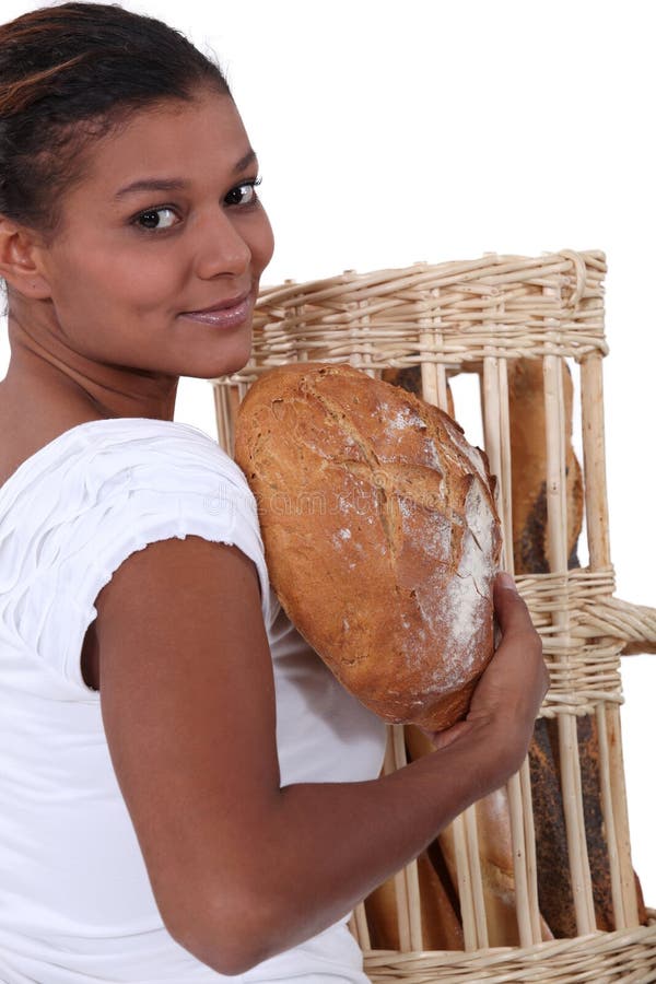 Pane della tenuta della donna fotografie stock libere da diritti Pane della tenuta della donna fotografie stock libere da diritti