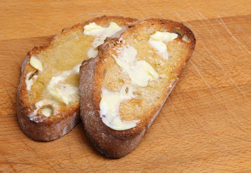 Pane tostato & burro immagini stock Pane tostato & burro immagini stock