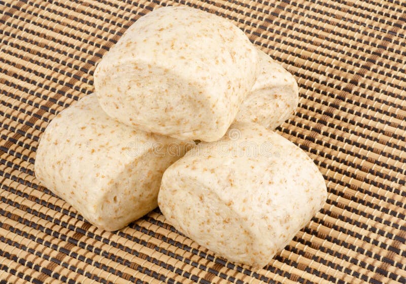 Bunch of steamed whole wheat buns on a place mat #1. Bunch of steamed whole wheat buns on a place mat #1.