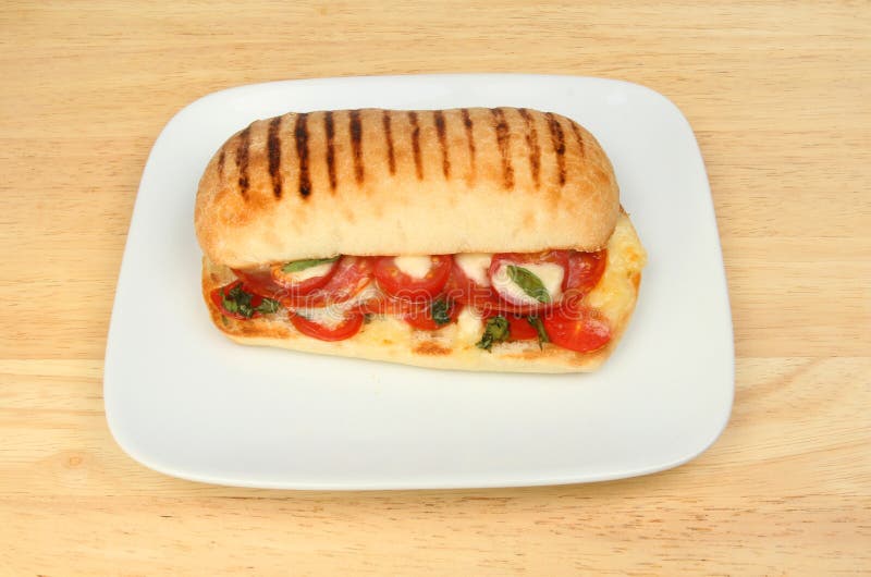 Panini su un ripiano del tavolo fotografie stock Panini su un ripiano del tavolo fotografie stock