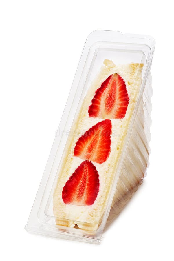 Panino dolce con fetta di fragola volgare e deliziosa, in confezioni belle ed eleganti fotografie stock