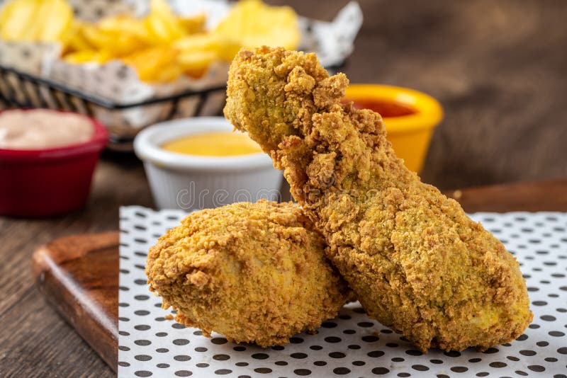 Panko Covered Fried Chicken Drumsticks with Sauce Stock Photo Image