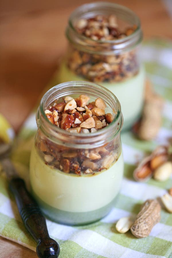 Panna cotta with matcha tea and peanuts