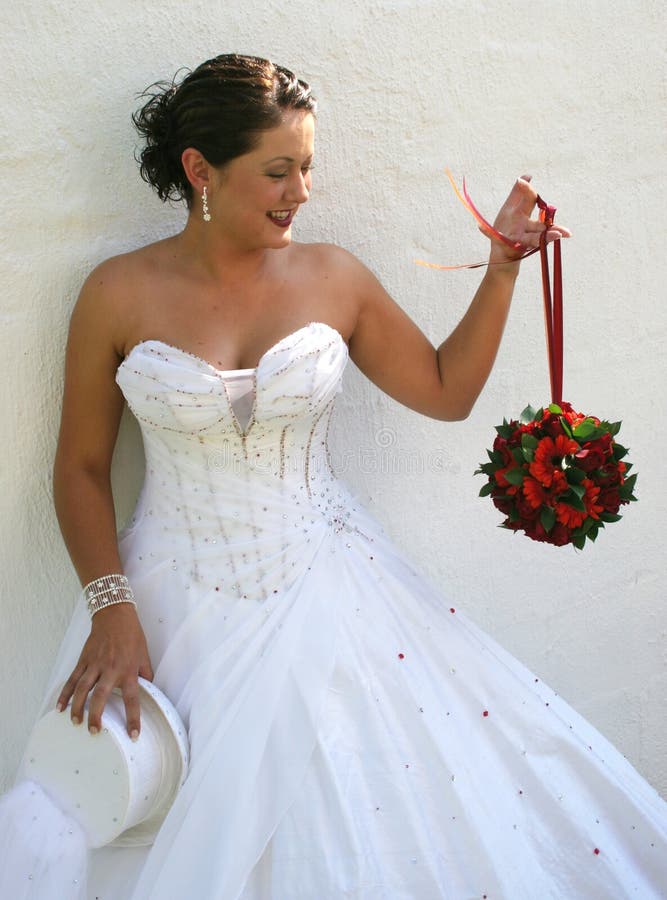 Bride during her photo session on her wedding day. Bride during her photo session on her wedding day