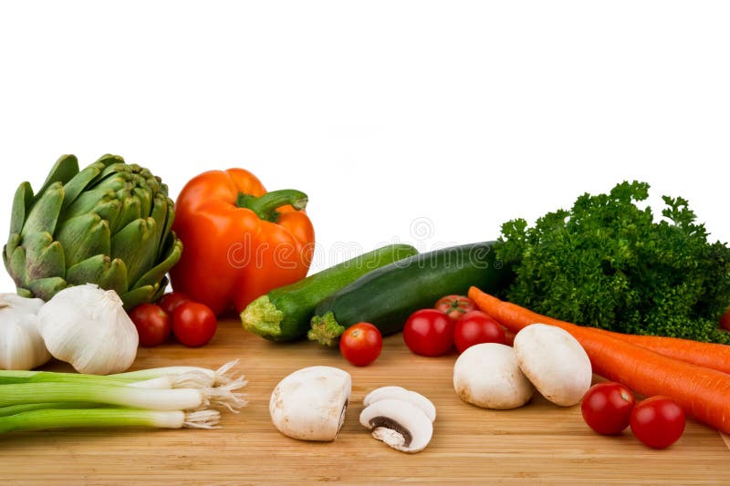 Panneau de découpage avec des légumes photo libre de droits Panneau de découpage avec des légumes photo libre de droits